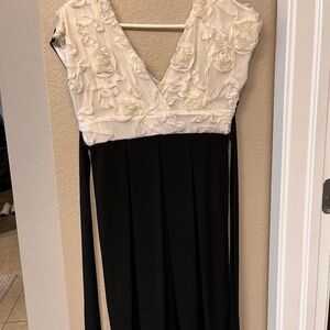 Women's size 4 dress, black, with cream top, 3D roses on top